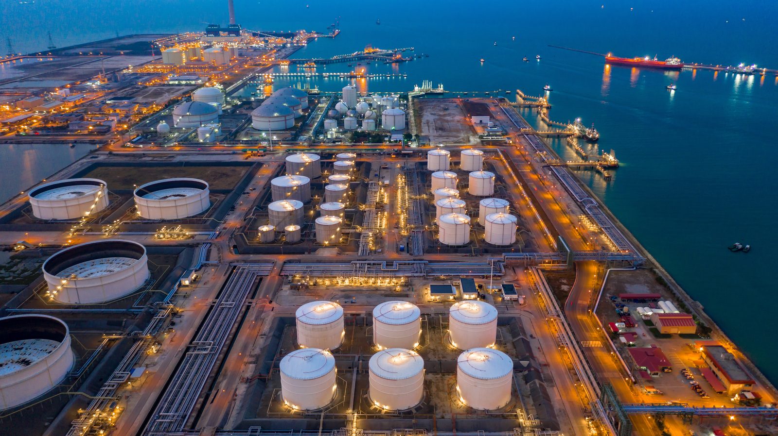 Oil and gas terminal at dusk